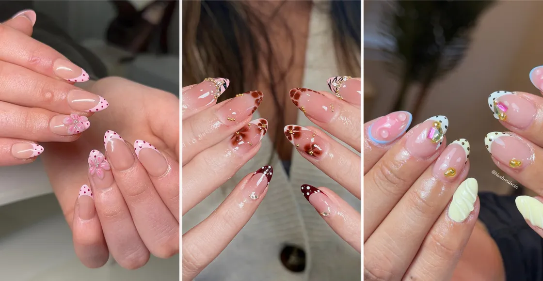 Short French tips nail art with burgundy polka dots and white flowers