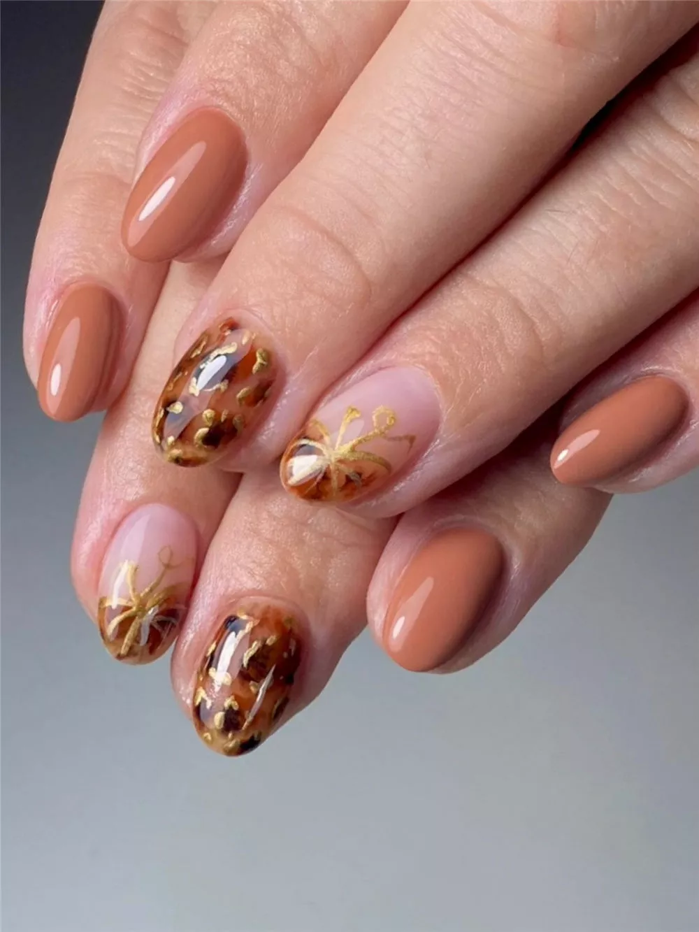 tortie and pumpkin nails for autumn