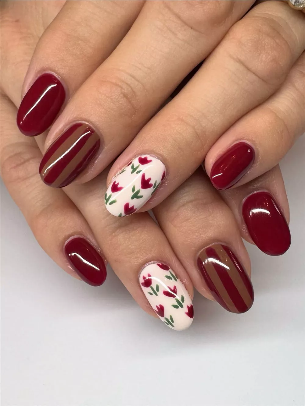 Maroon and white nails